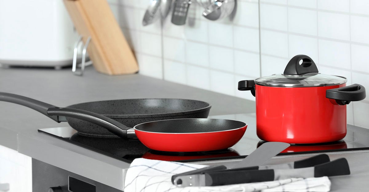 Various cookware on kitchen stove