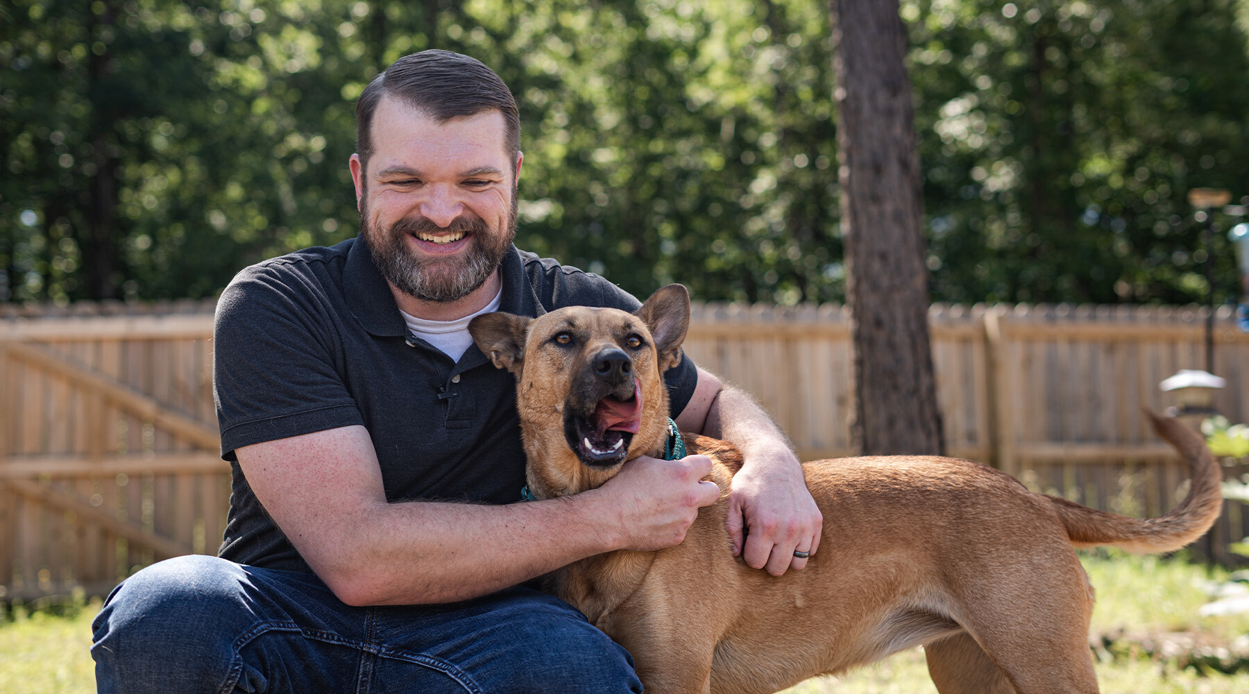 Tyler and Molly from Corporate in the yard together making silly faces for the camera