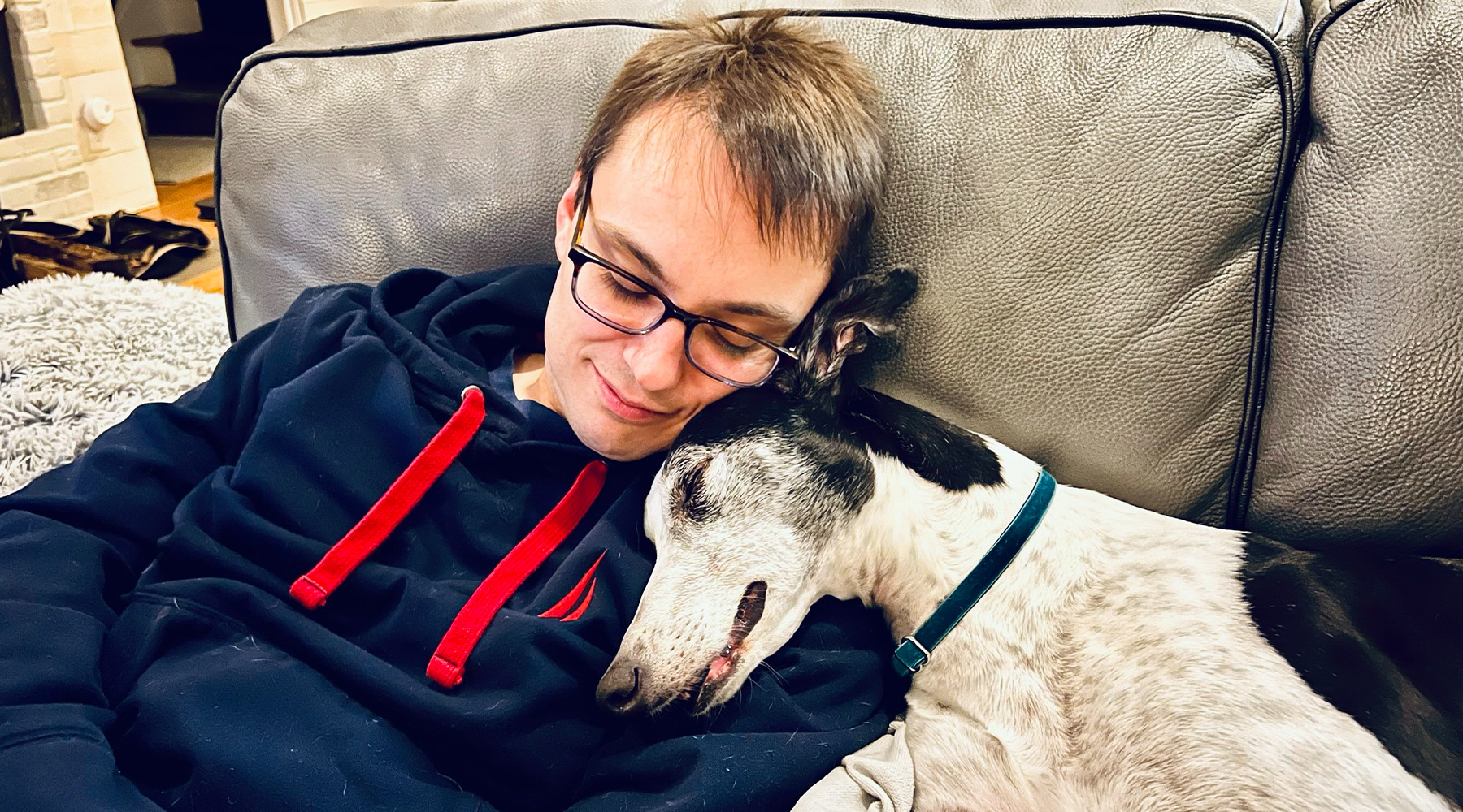 Jeremy and Joon cuddle on the couch