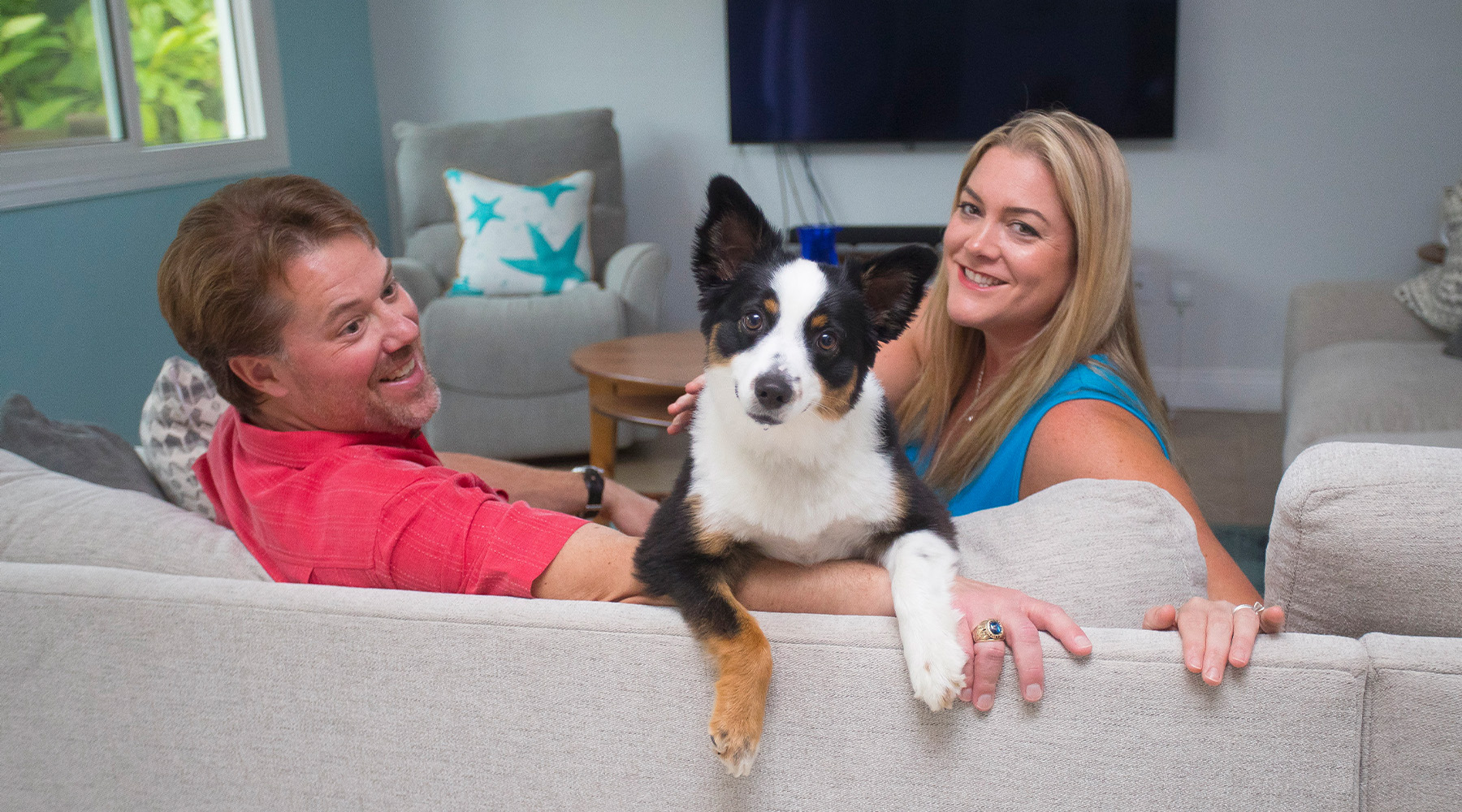 Kelly, Marc and Dublin on the couch